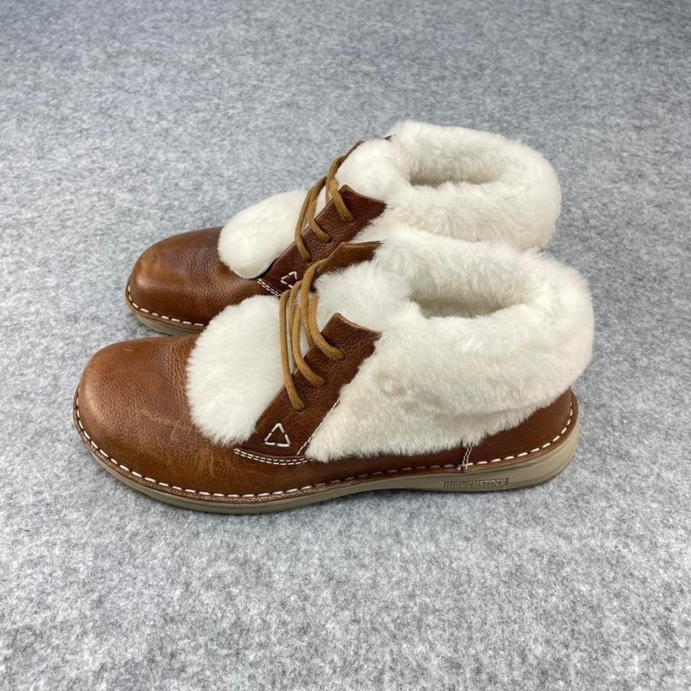 Birkenstock brown leather ankle boots with white fur trim. Size US 8